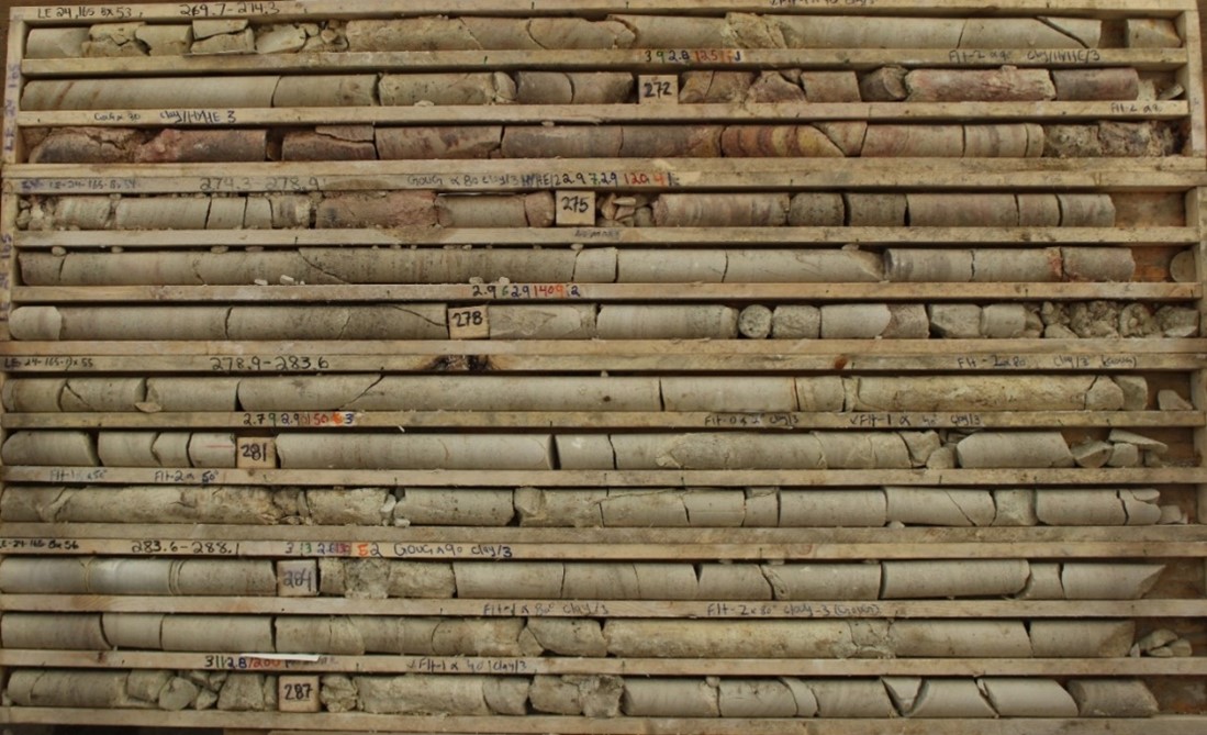 Altered sandstone 17 to 35 metres above the unconformity in Target Area B (LE24-165, 269.7-288.1m). The core is strongly bleached with intervals of desilicification, strong clay alteration (mostly in the lower six rows) and local secondary hematite (some of the hematite in rows two to four). Mineral spectroscopy classifies the clay as 100% illite.